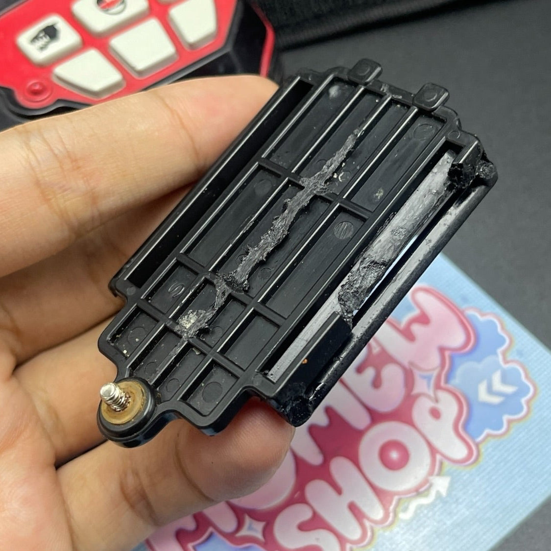 Back side of Power Rangers Time Force Quantum Morpher showing battery compartment and mounting clip