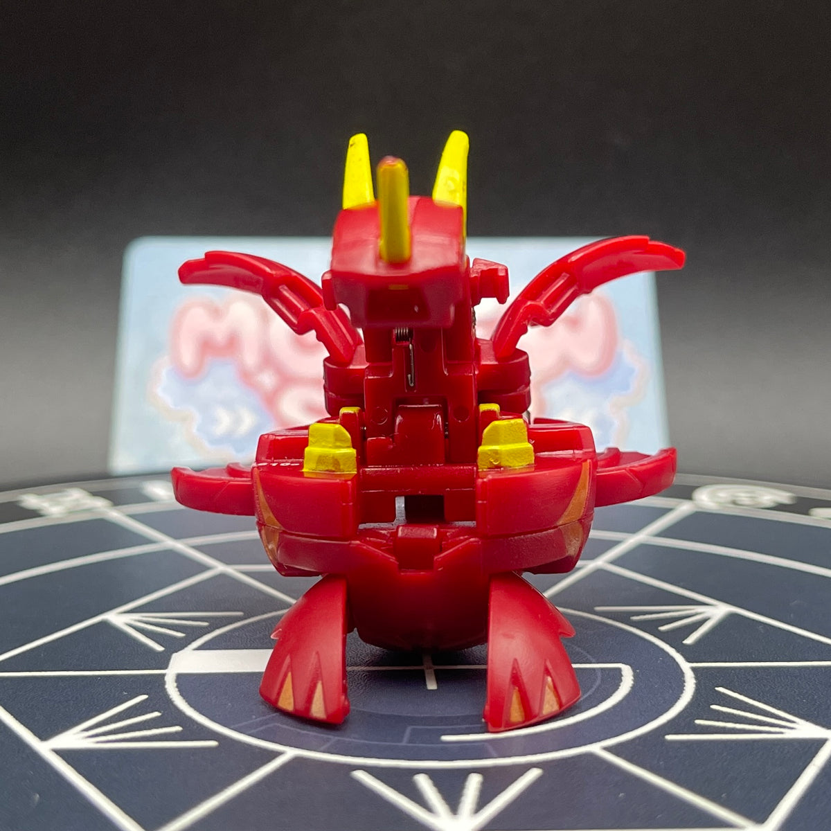 Front view of Pyrus Neo Dragonoid in open dragon mode showing head horn and spread wings