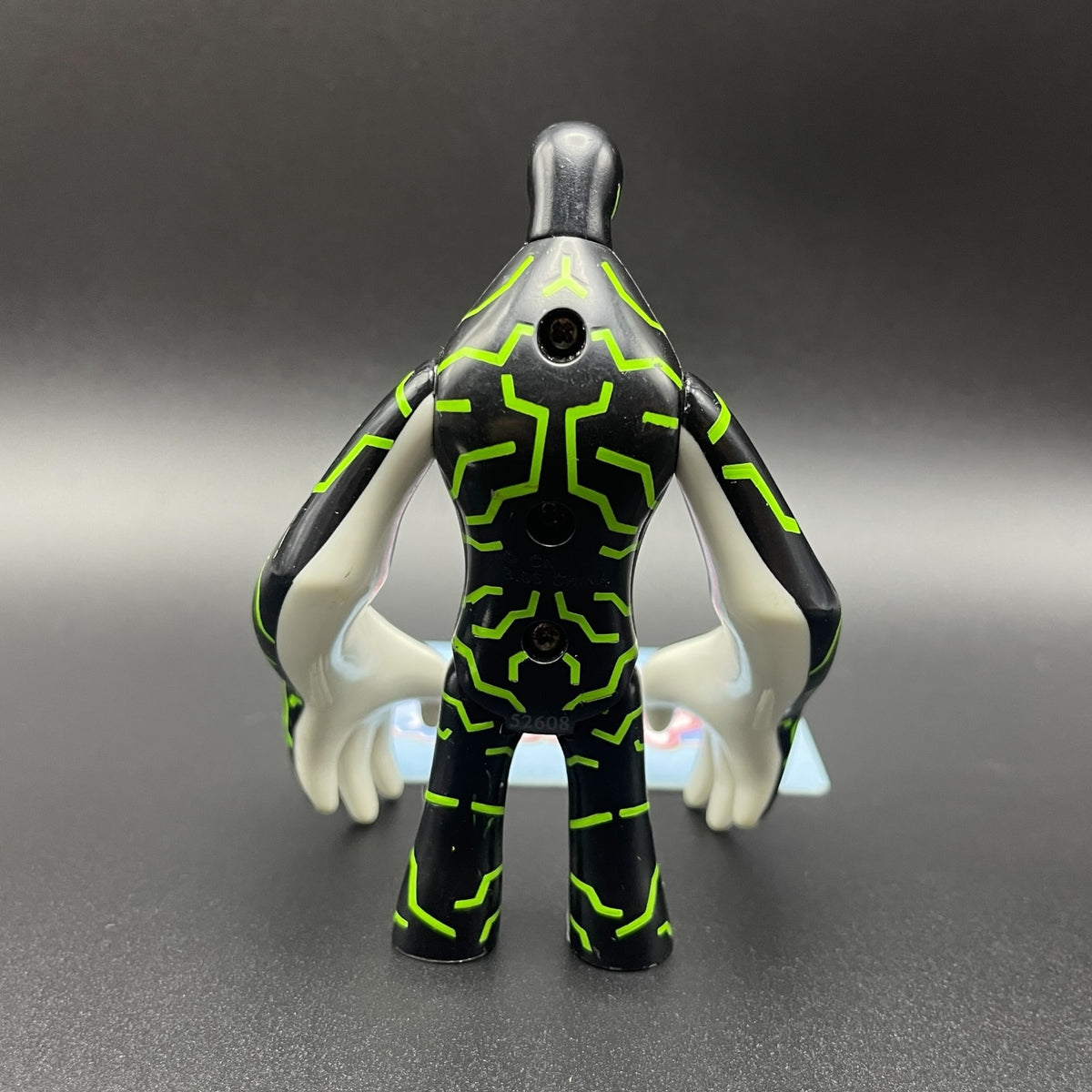 Back view of the Ben 10 Classic Upgrade action figure showing circuit details.