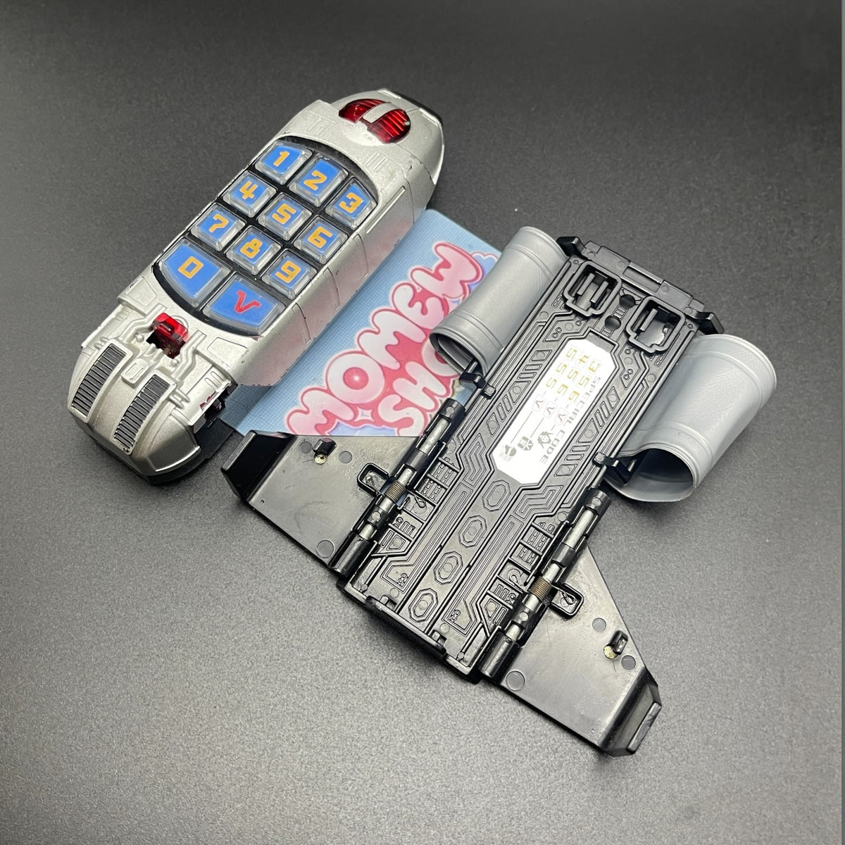 Battle Booster Super Train Morpher toy comparison layout showing deployed and standard modes.