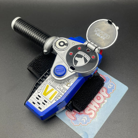Opened view showing the dial and details of the Power Rangers SPD Omega Morpher.