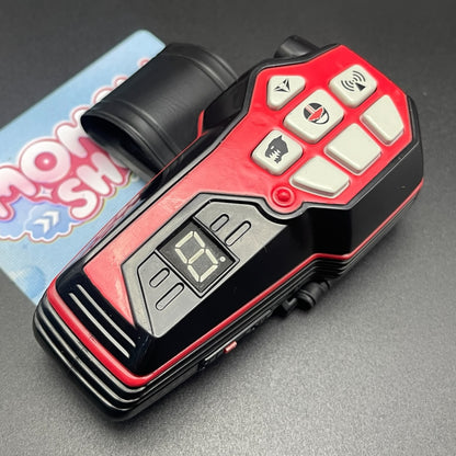 Angled top view of Power Rangers Time Force Quantum Morpher displaying sleek casing design and wrist mount attachment   