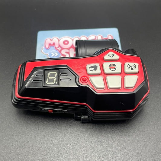 Power Rangers Time Force Quantum Morpher toy featuring red and black body with digital screen and white control buttons on dark background   