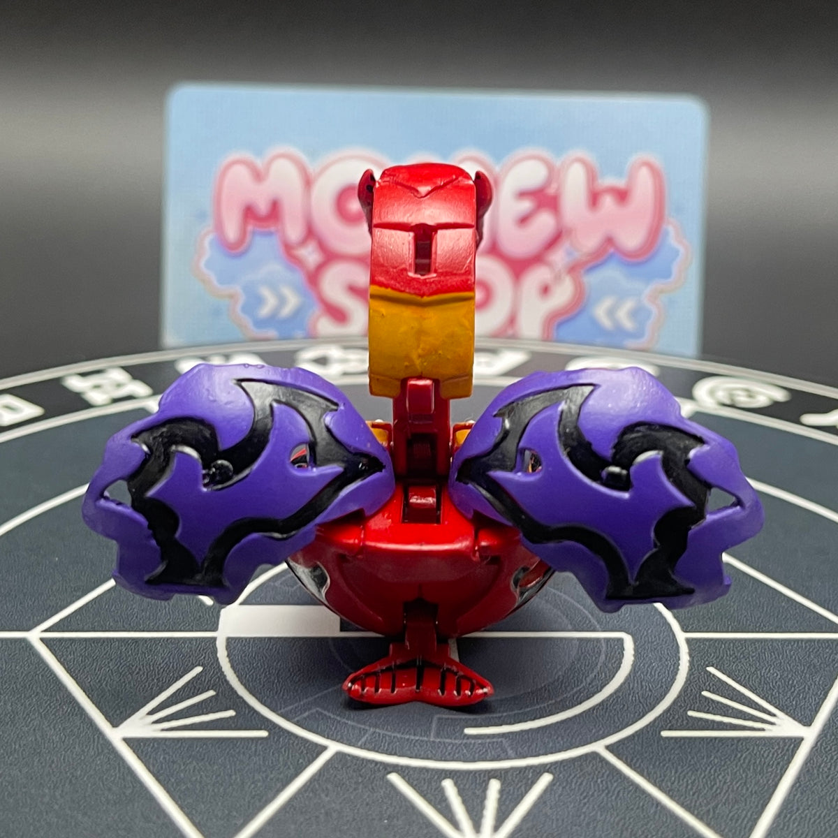 Back view of the custom painted Druman Bakugan showing its wings and detailed paintwork.
