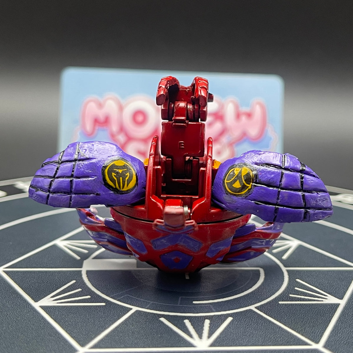 Back view of the custom painted Druman Bakugan showing its wings and detailed paintwork.