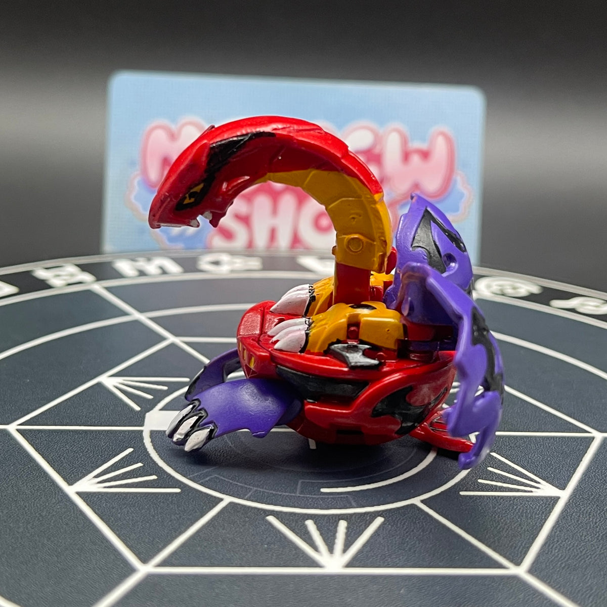 Right side angle of the painted Druman Bakugan collectible toy.