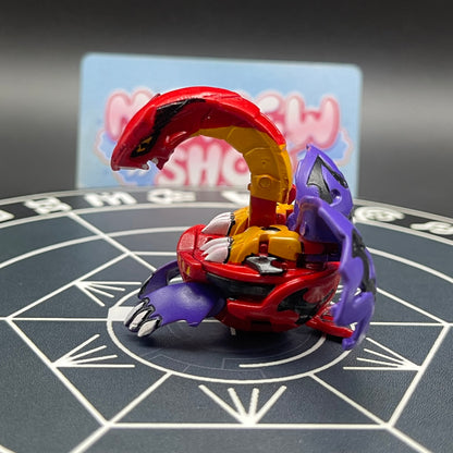 Right side angle of the painted Druman Bakugan collectible toy.