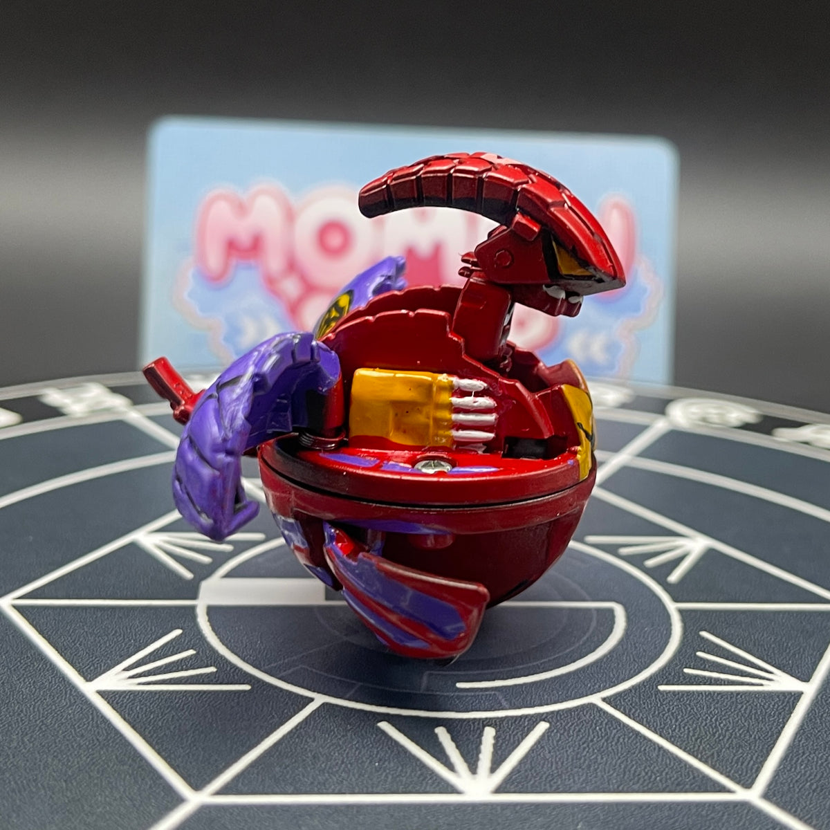Right side angle of the painted Druman Bakugan collectible toy.