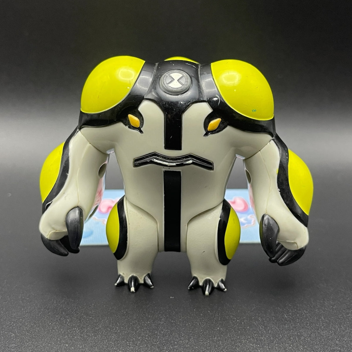 Ben 10 Classic Cannonbolt alien action figure front view showing yellow and white armored body