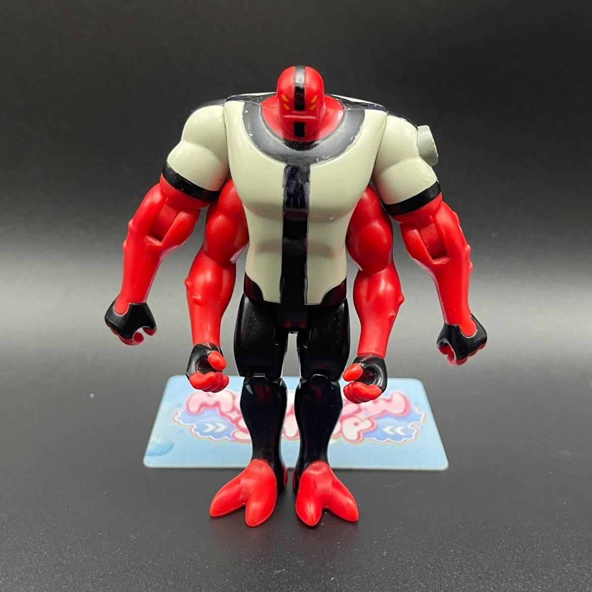 Ben 10 Classic Four Arms alien action figure front view showing red skin and four-armed body structure.