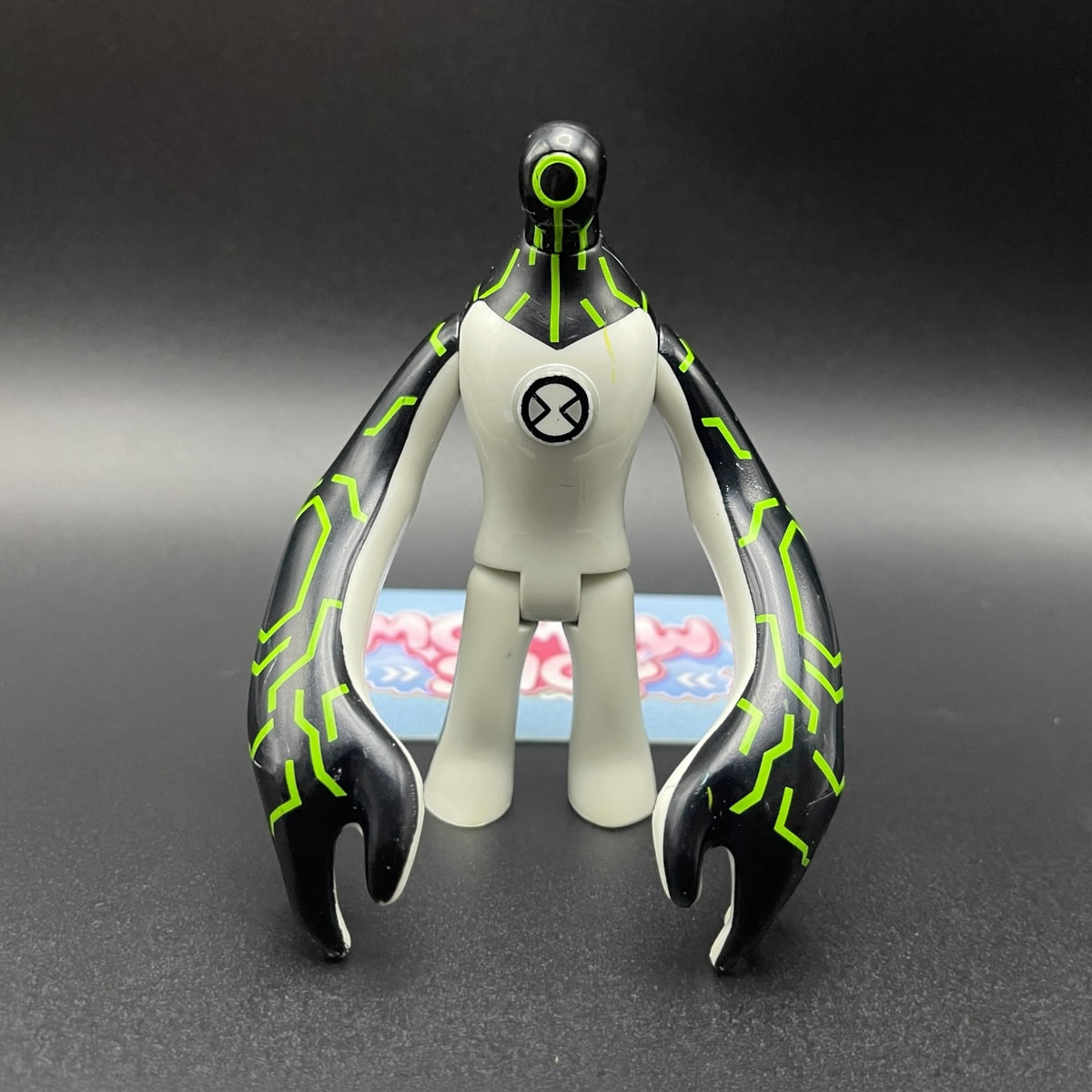 Ben 10 Classic Upgrade Galvanic Mechamorph alien action figure front view with green circuit line patterns.