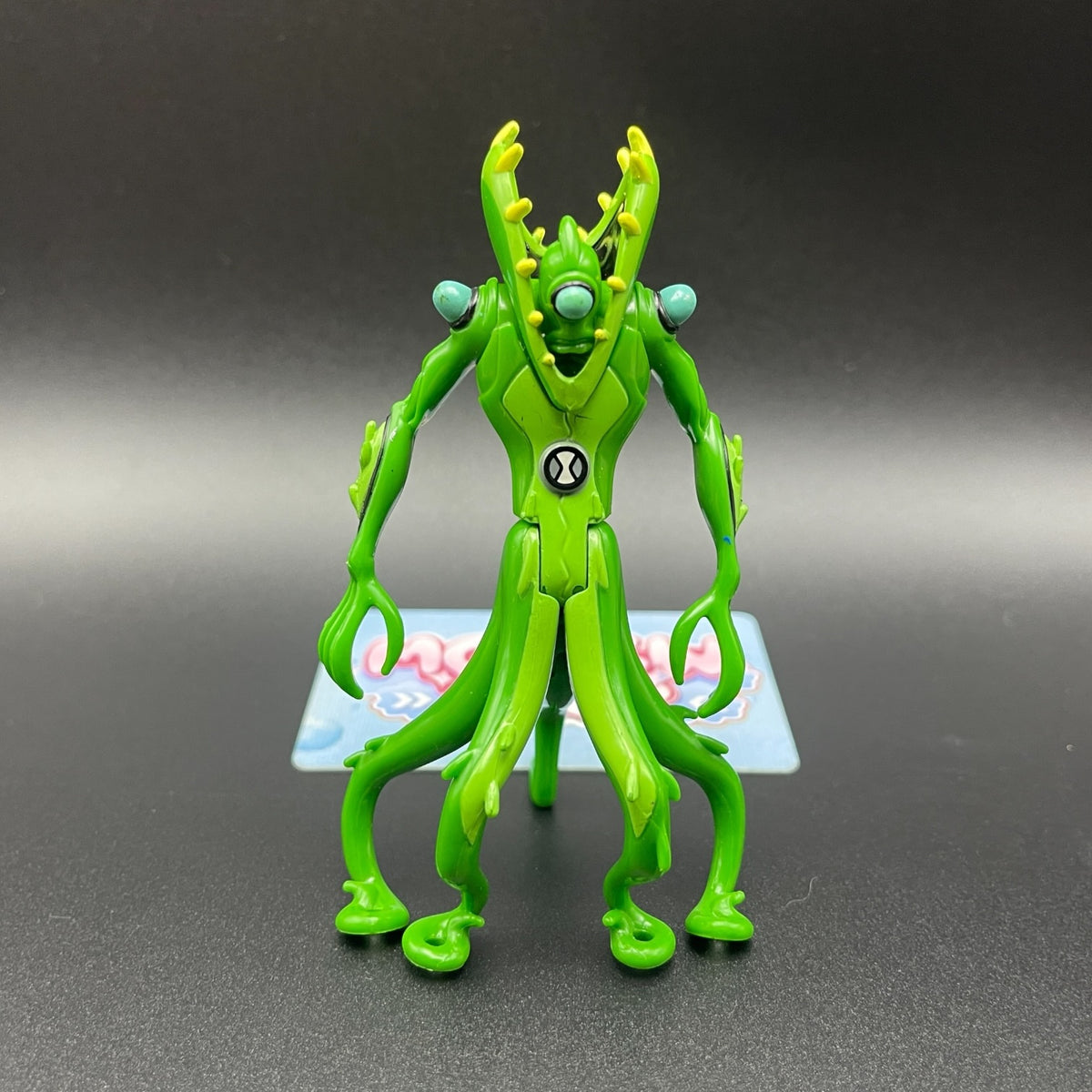 Ben 10 Classic Wildvine plant alien action figure front view with green vine body structure.
