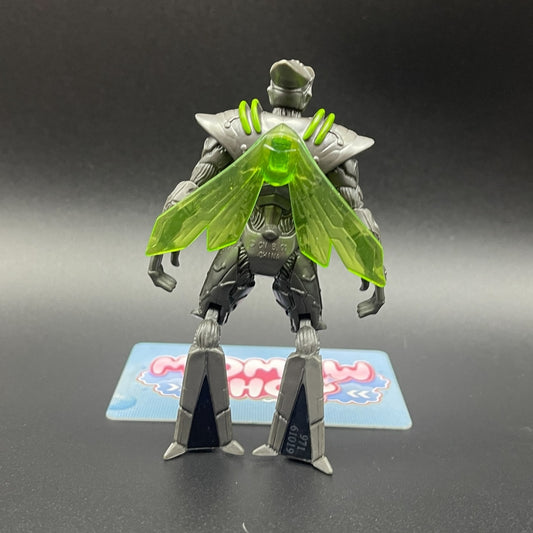 Back view of Nanomech action figure from Ben 10 Alien Swarm showing translucent green wings and detailed armor design.