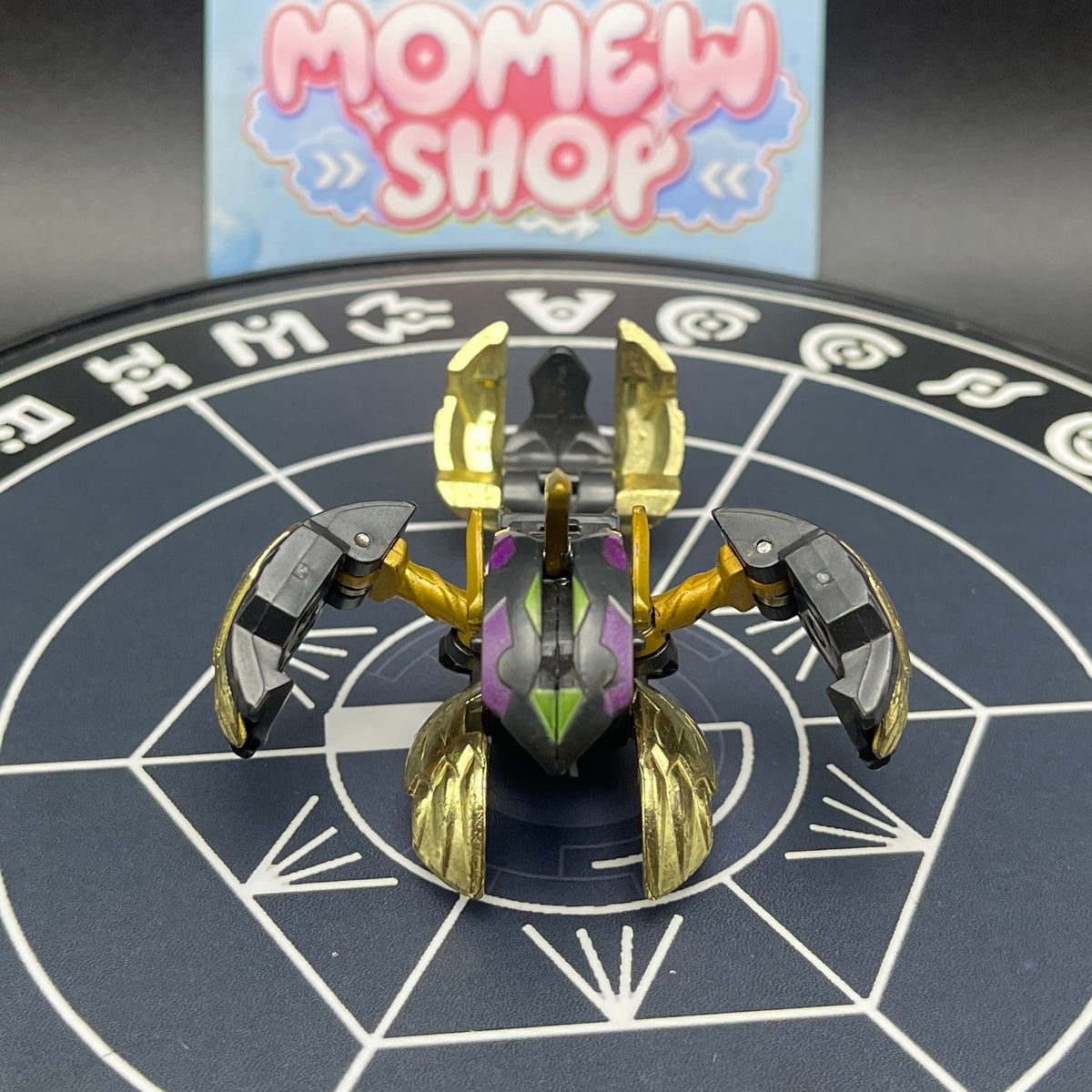 Spread open pose of Darkus Seis Tavanel Metal Cross Baku Tech Bakugan highlighting metal cross components.