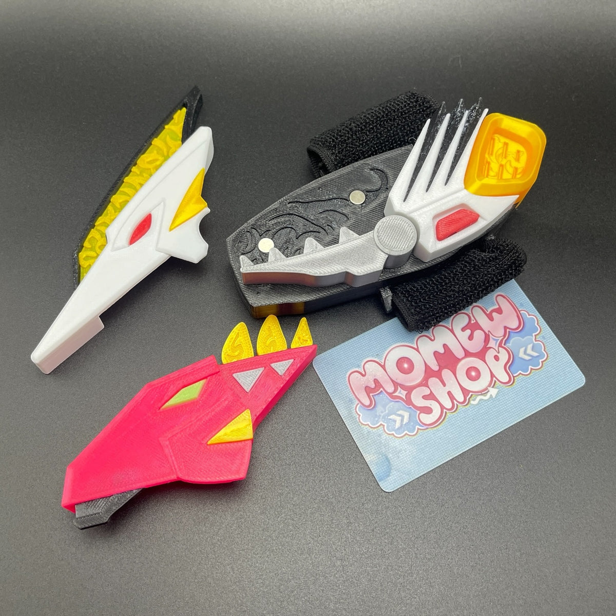 Close-up of 3D printed components for White Drago Morpher prop replica.