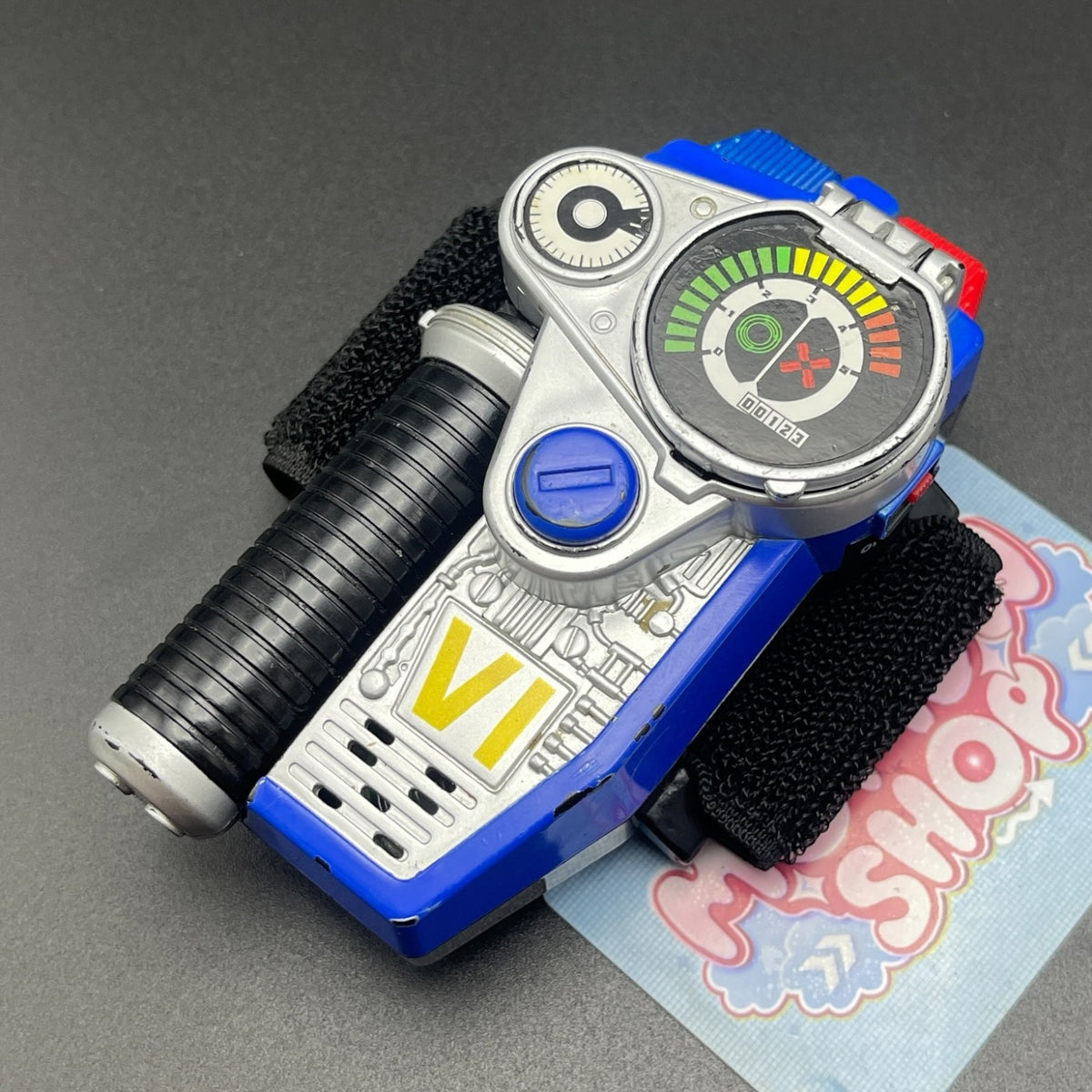 Front view of the US version Power Rangers SPD Omega Morpher roleplay electronic toy.