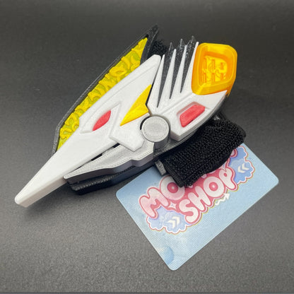 Main unit of the White Drago Morpher prop replica in white, yellow, and red design.