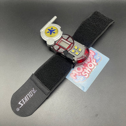 Power Rangers Lightspeed Rescue Rescuer Morpher attached with an replacement wrist strap fully extended.