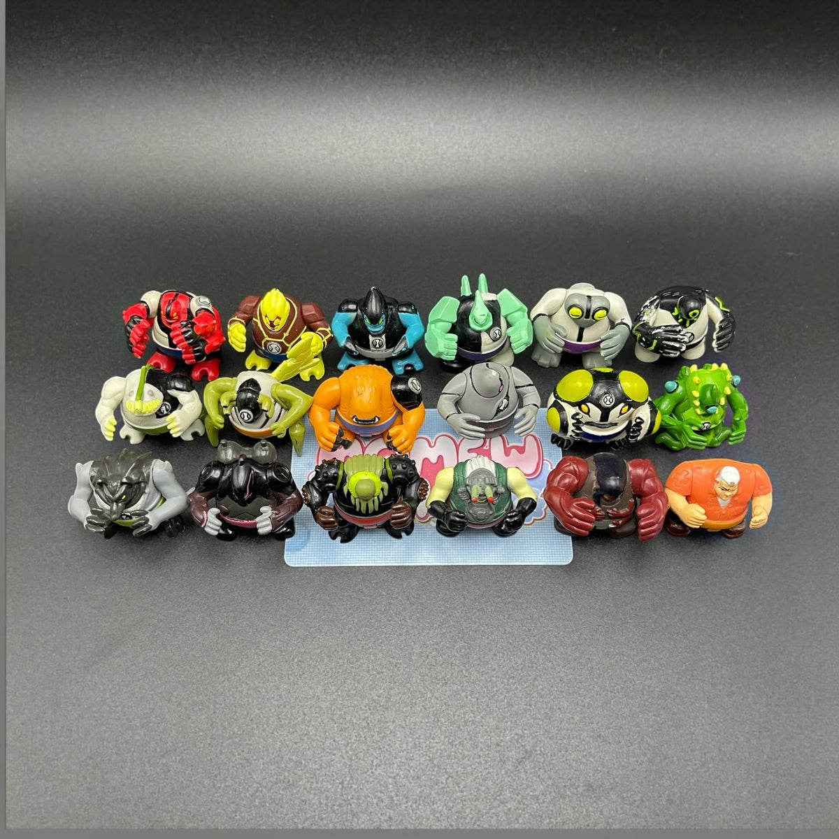 Collection display of Ben 10 Sumo Slammers action figures.