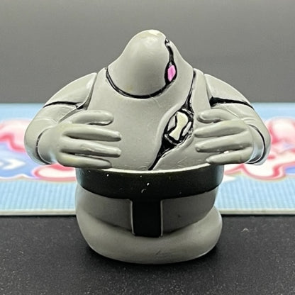 Ghostfreak character styled as a Sumo Slammer action figure.  