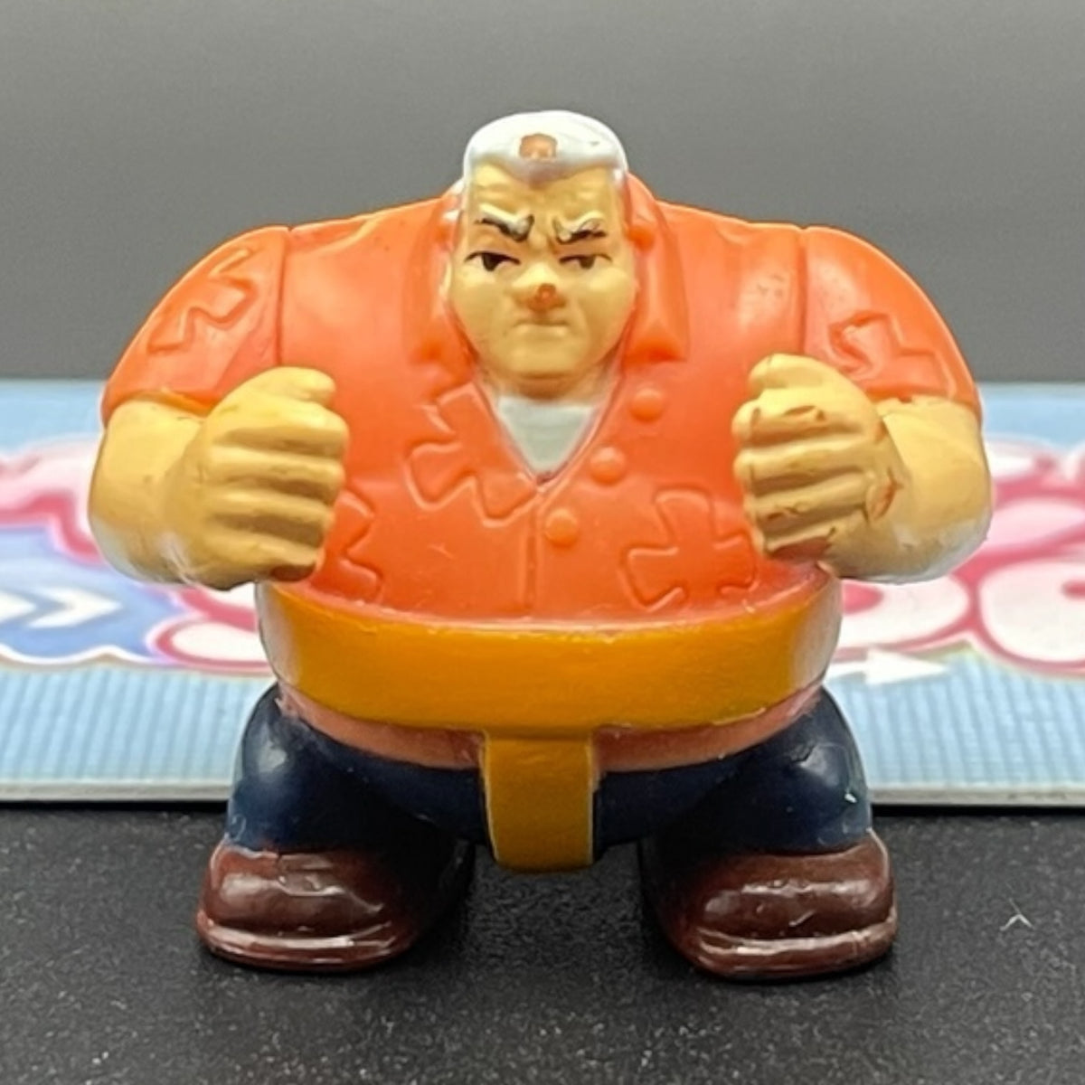 Grandpa Max Tennyson character in Sumo Slammers wrestling gear.