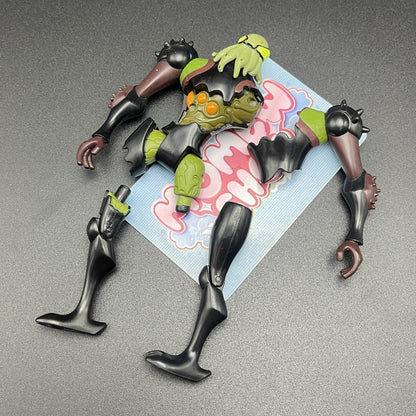 Overhead layout of the classic Vilgax action figure with accessories on display