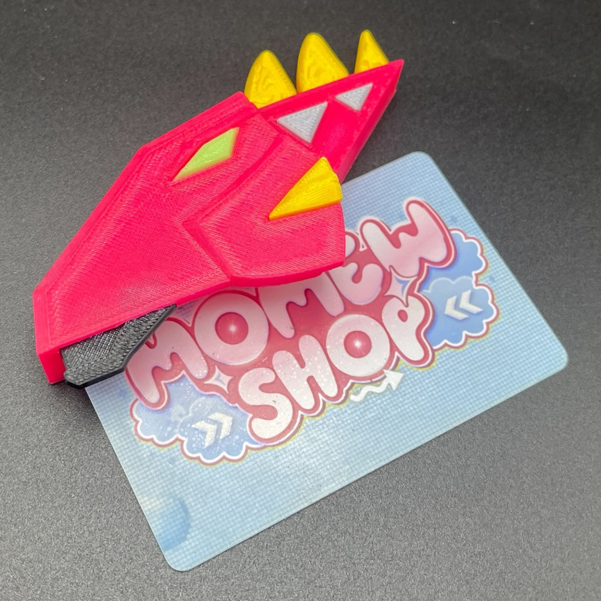 Close-up of the 3D printed pink accessory piece for White Drago Morpher.