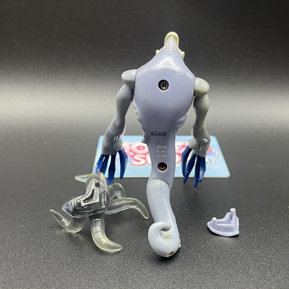 Back view of the Ben 10 Classic Zs'Skayr action figure and component parts.