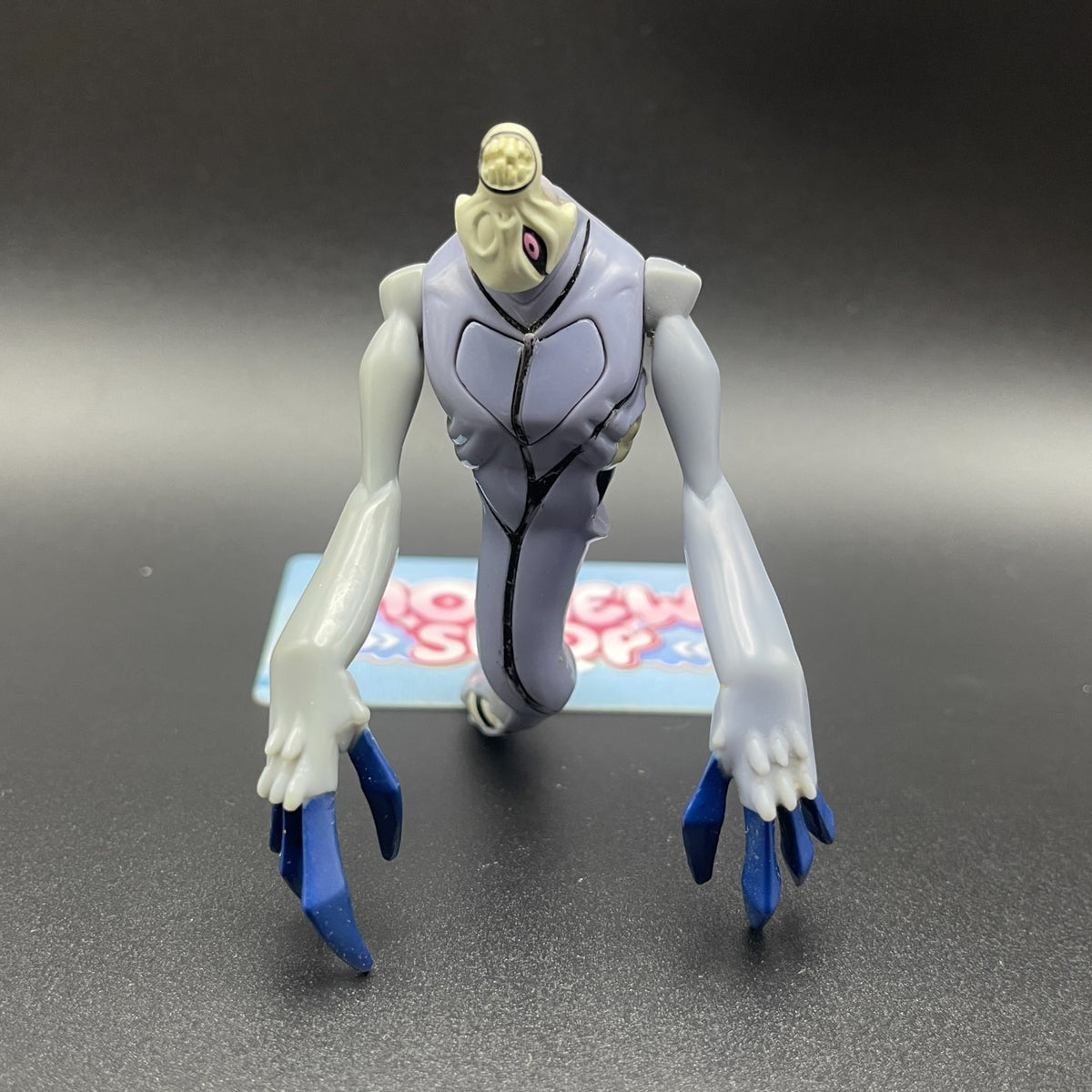 Front view of the Ben 10 Classic Zs'Skayr action figure without outer shell.